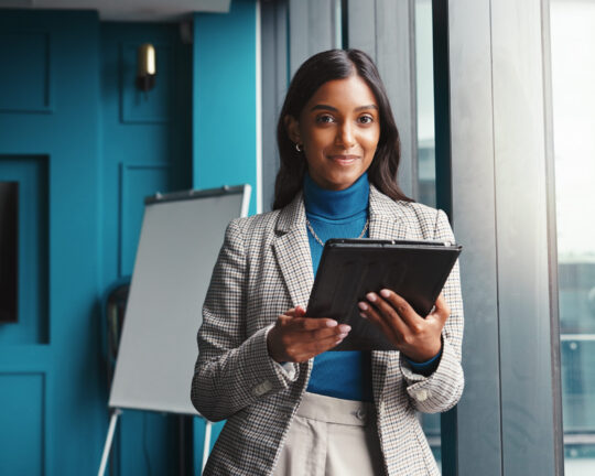 Portrait, confident and woman with tablet, window and online for financial report in office and smile. Corporate, accountant and person with tech for tax filing, app and info for profit of business